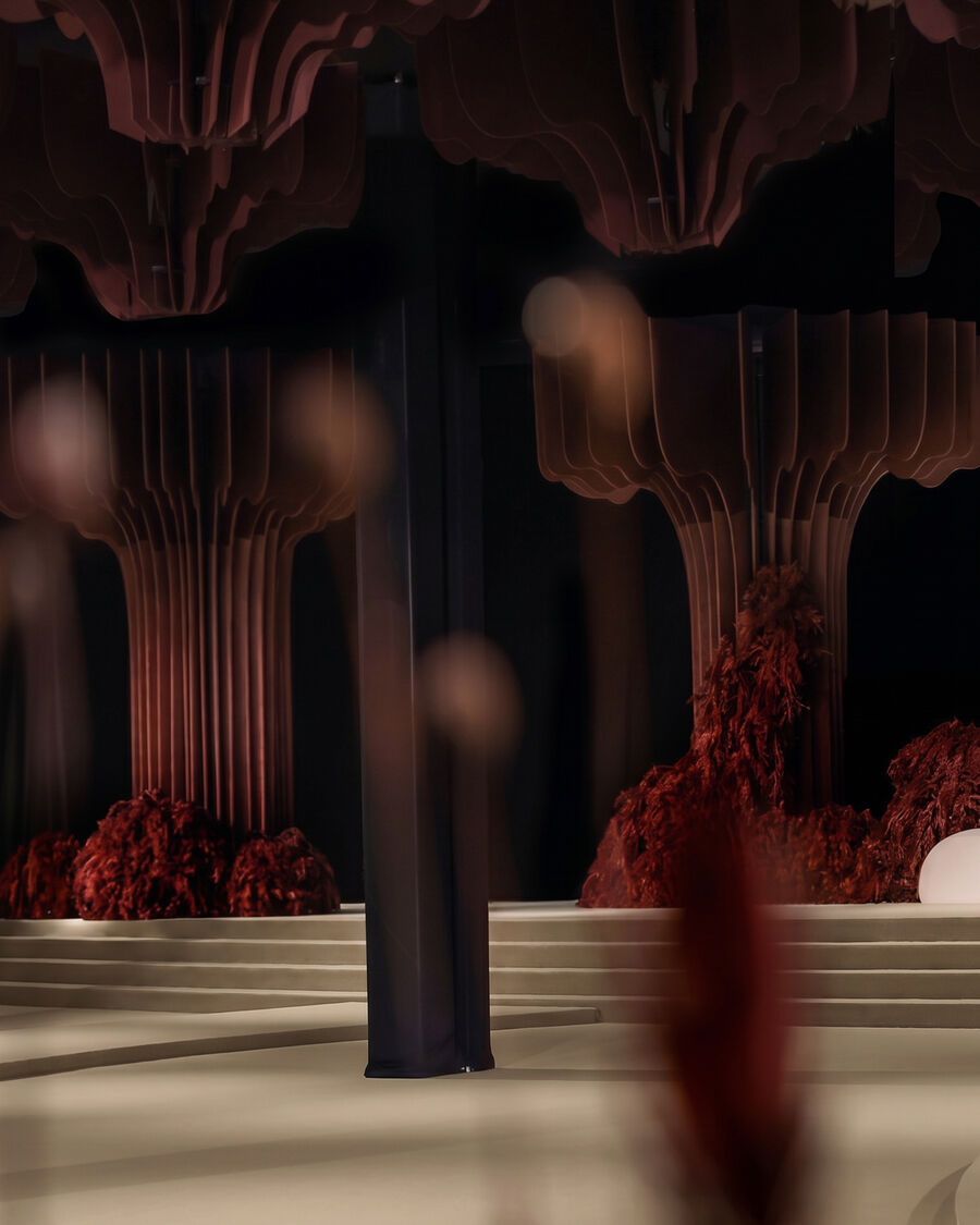 Sculptural burgundy wedding stage UAE